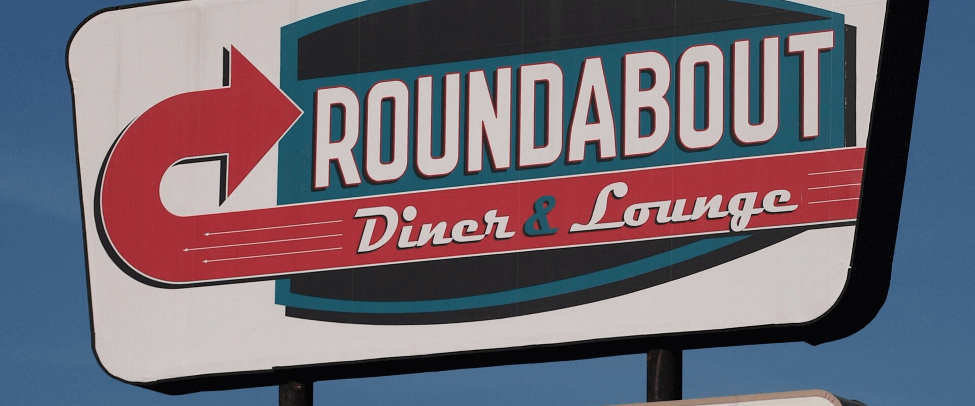 roundabout diner road sign